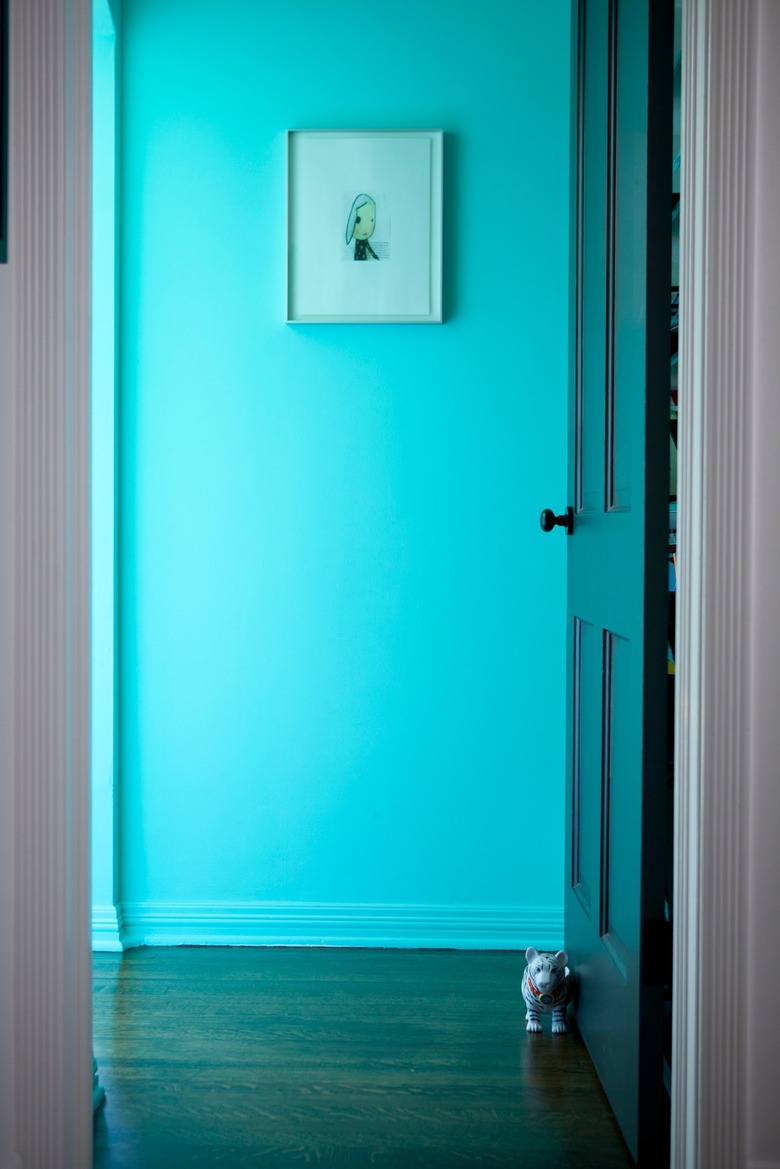 A vibrant blue hallway.