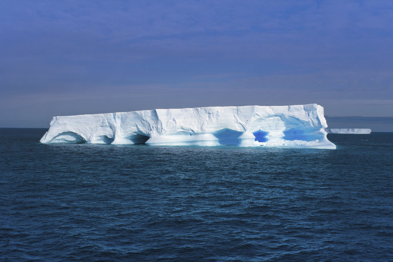 Flat iceberg floating at Antarctic Peninsula