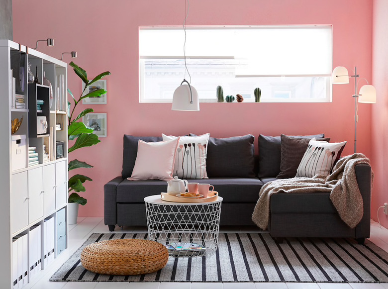 pink living room with sectional sofa