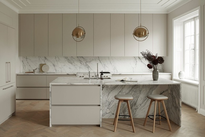 Scandinavian kitchen with herringbone wood flooring