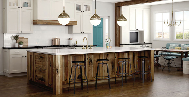 kitchen space with white cabinets and hickory cabinets