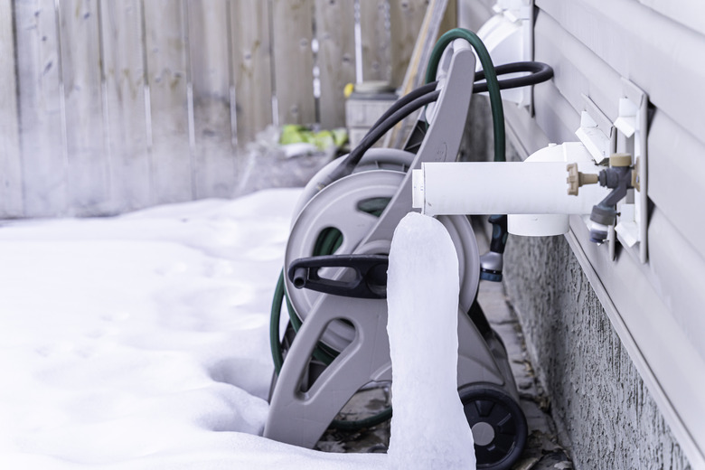 Furnace exhaust pipe blowing out steam in winter