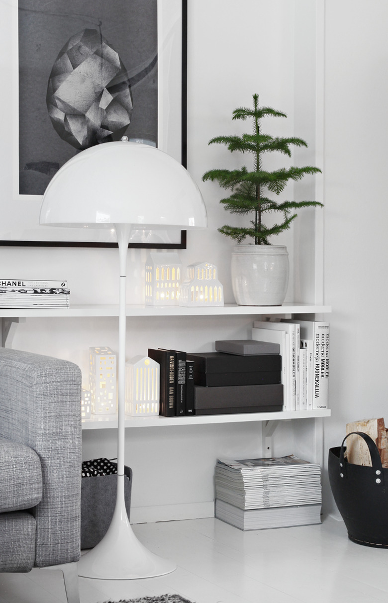 black and white scandinavian interior with mini potted pine tree