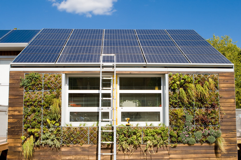 Solar Home Under Repair with Ladder, Gray Water System