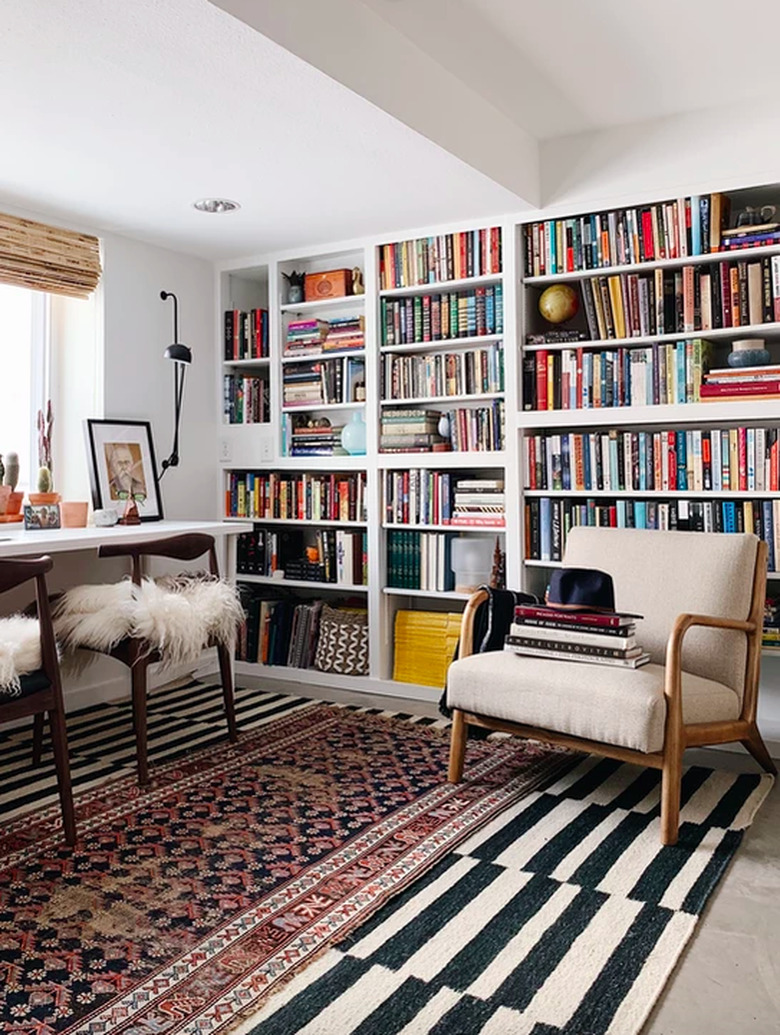 Home Office Built Ins with A wall-to-wall built-in library in a home office by Undecorated Home