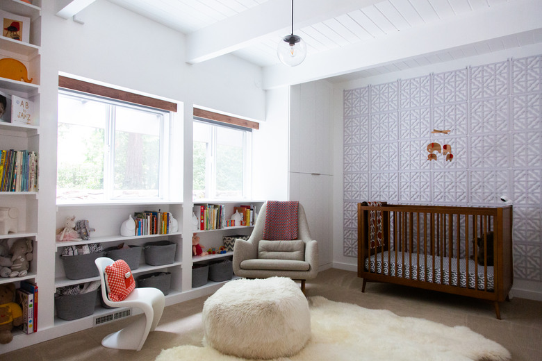 organized nursery with built-ins and bins