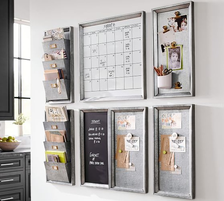 Homeschool Organization with Metal file wall file holders, whiteboard, metal magnetic boards, chalkboard.