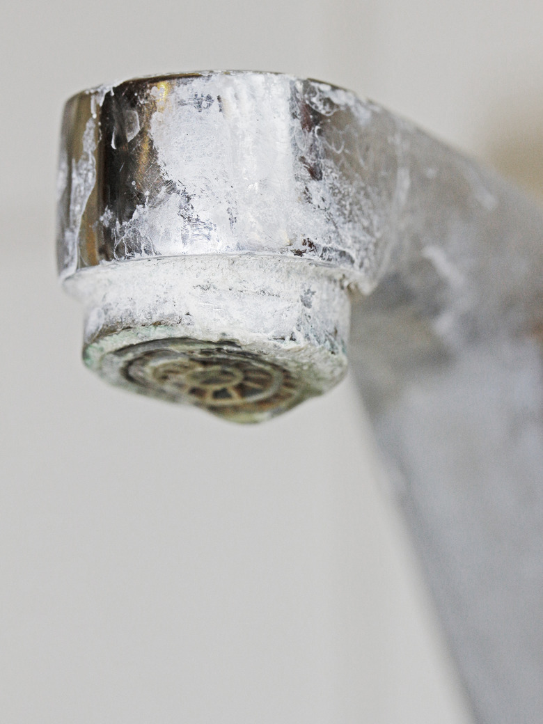 Calcified bathroom fittings in a hotel