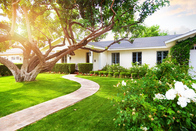 Beautiful home with healthy-looking lawn.