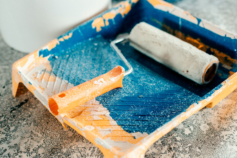 Paint-stained tray and paint roller. Real non-staged view