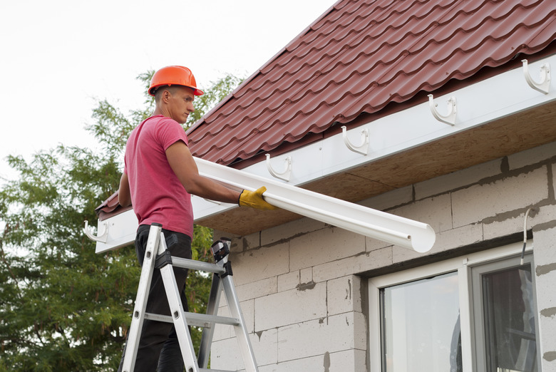 Gutter system being installed.