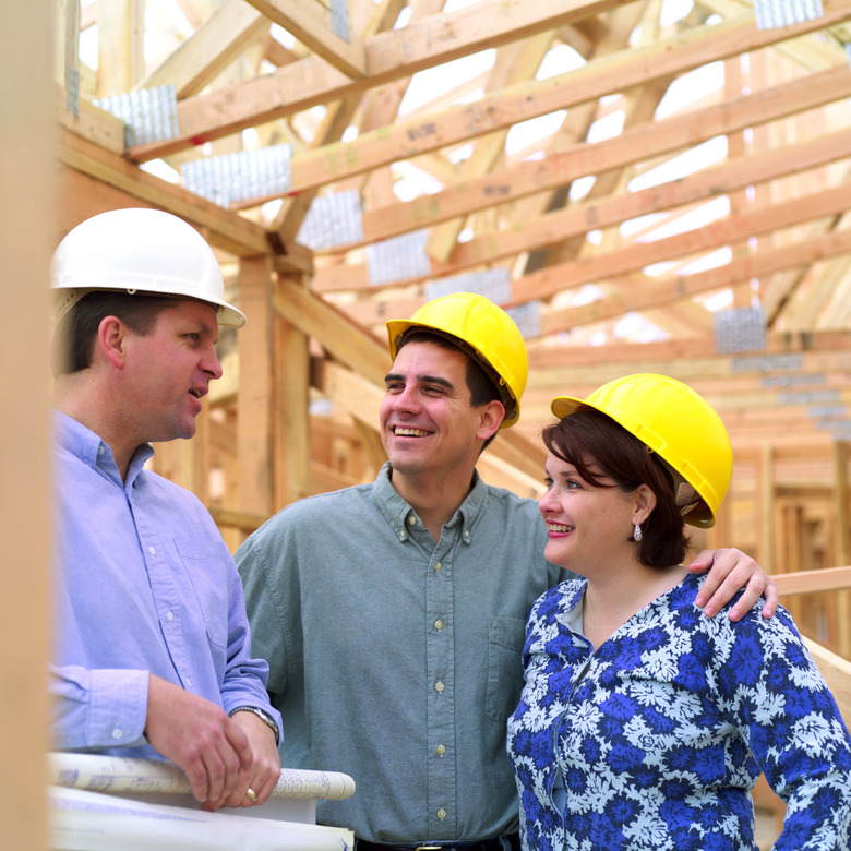 Couple talking to architect