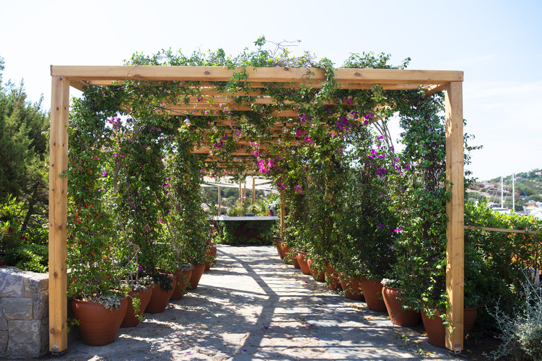 Wooden open pavilion with flowers