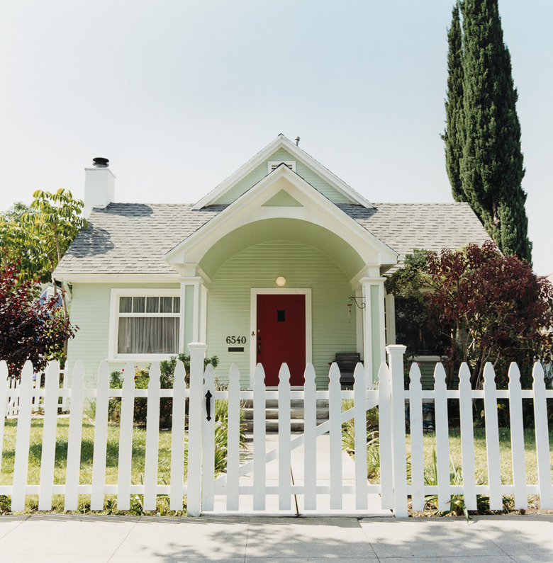 White Picket Fence Before House