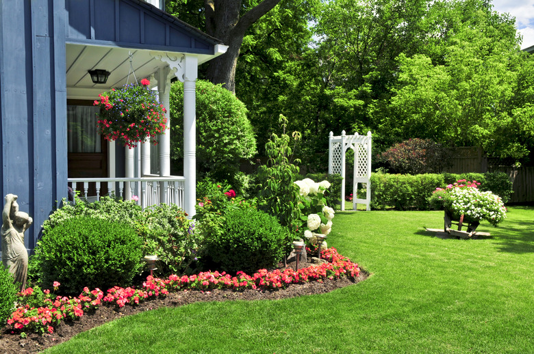 Front of house with garden beds.