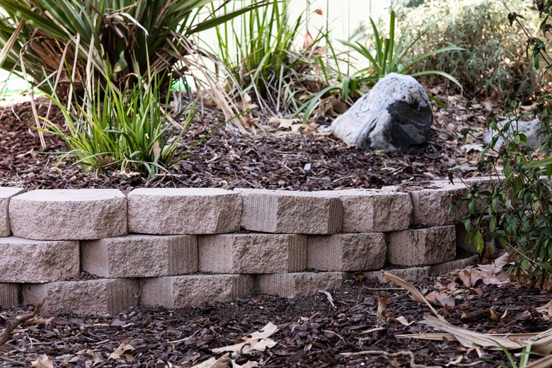 A garden retaining wall made of interlocking blocks