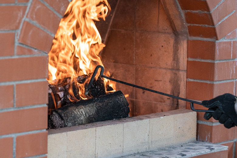 logs burning in the fireplace close-up