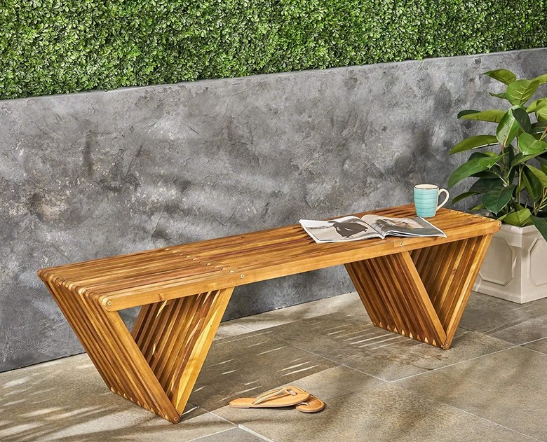 Outdoor acacia wood bench, teak finish.