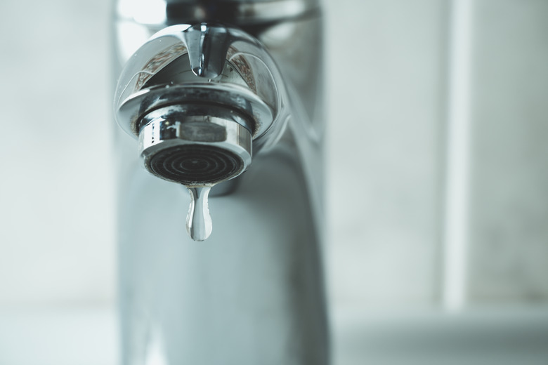 water drop dripping from the tap