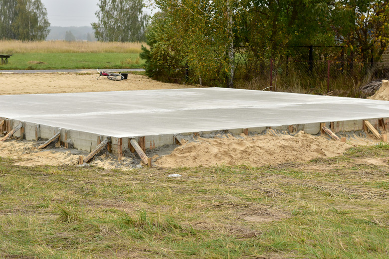 Concrete poured slab foundation in formwork.