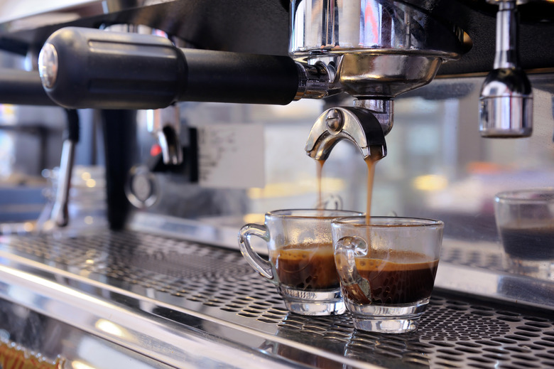 Espresso machine filling two cups of coffee