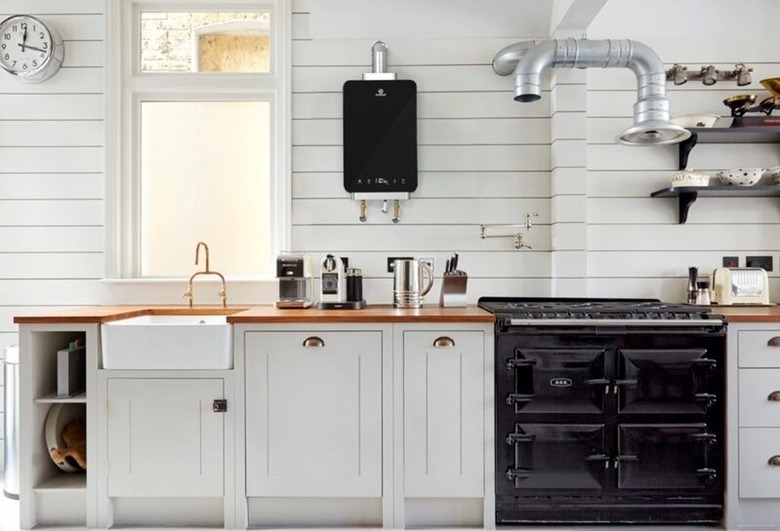 Black LP Tankless Water Heater on Wall in Modern White Kitchen