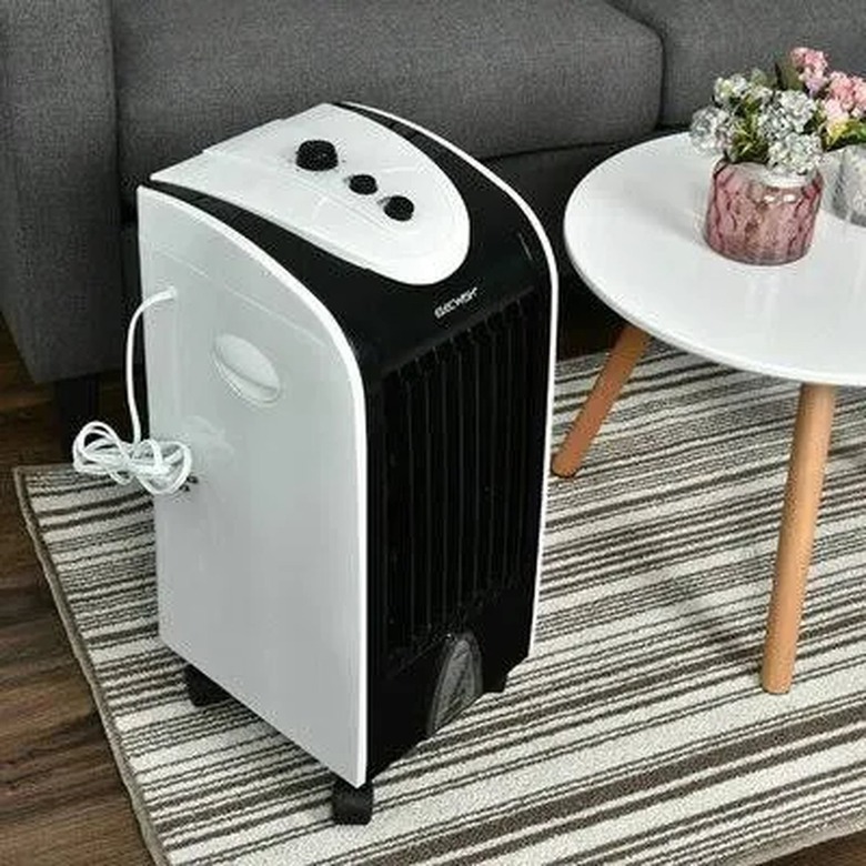 A portable evaporative cooler in a living room