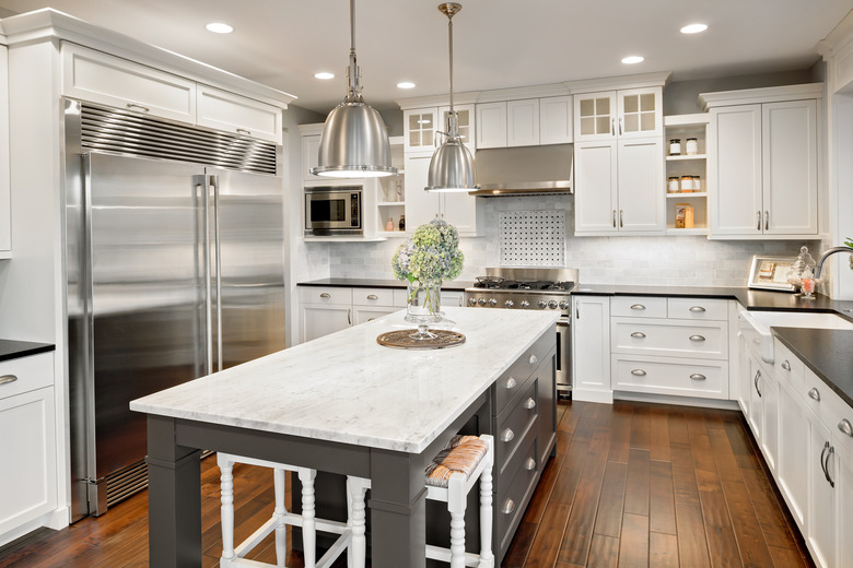 Beautiful Kitchen in Luxury Home with Island and Stainless Steel