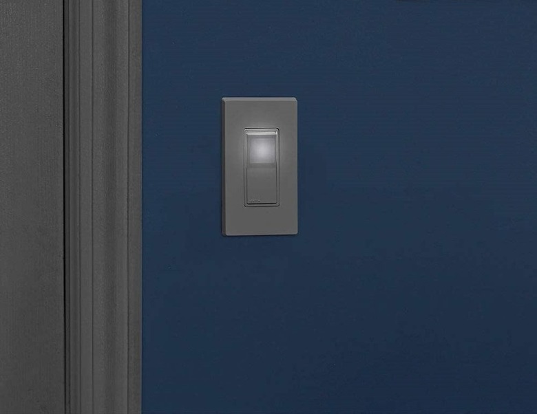 Leviton Decora LED Illuminated Rocker White Light Switch on Blue Wall