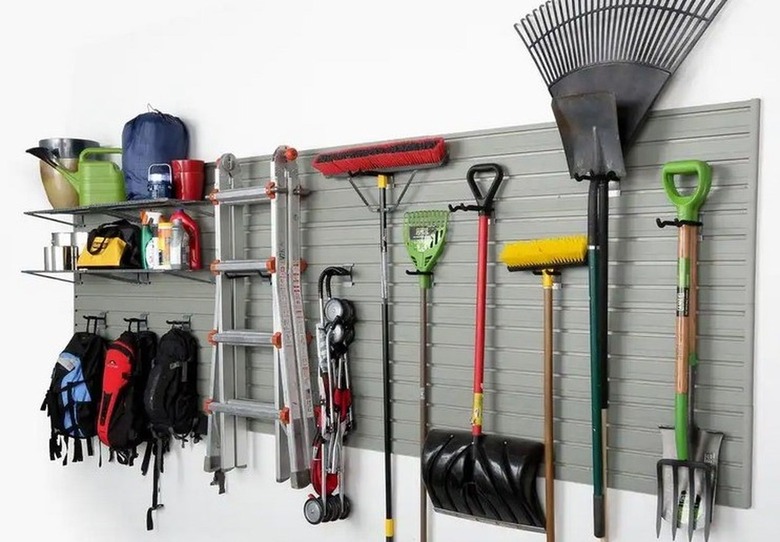 Garage wall panel organizer.