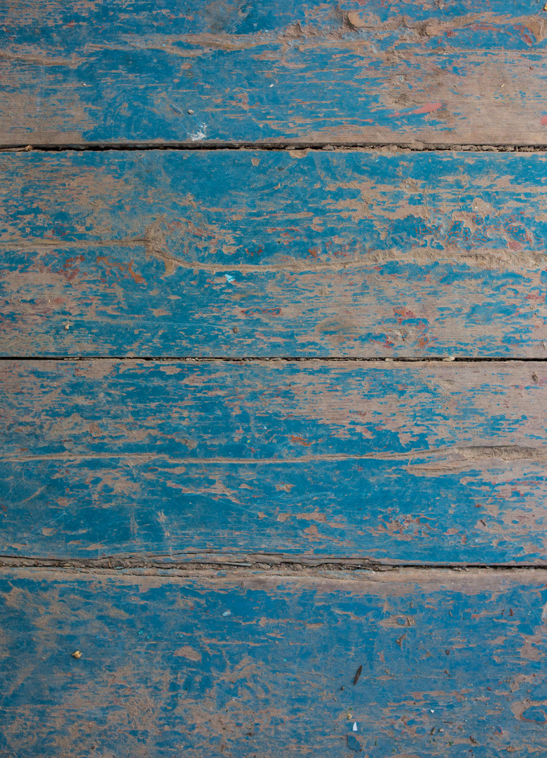 Old vintage blue and beige painted wooden planks. Rustic background texture.