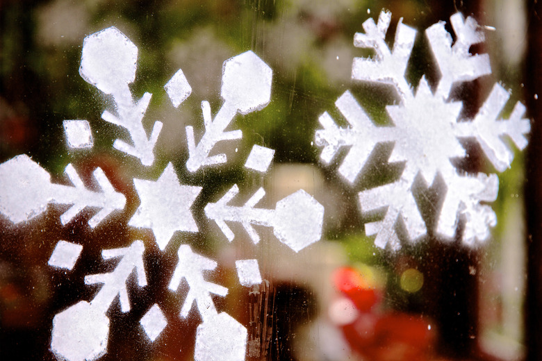 Stenciled Snowflakes On Window Glass