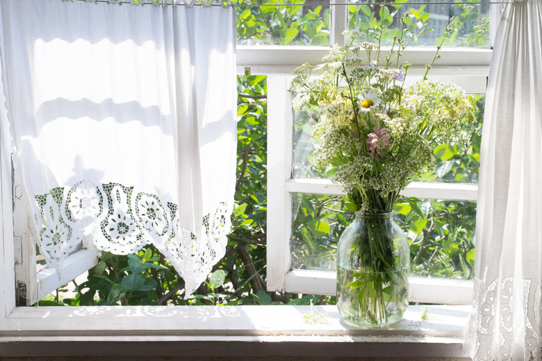 Wild flowers on windowsill.