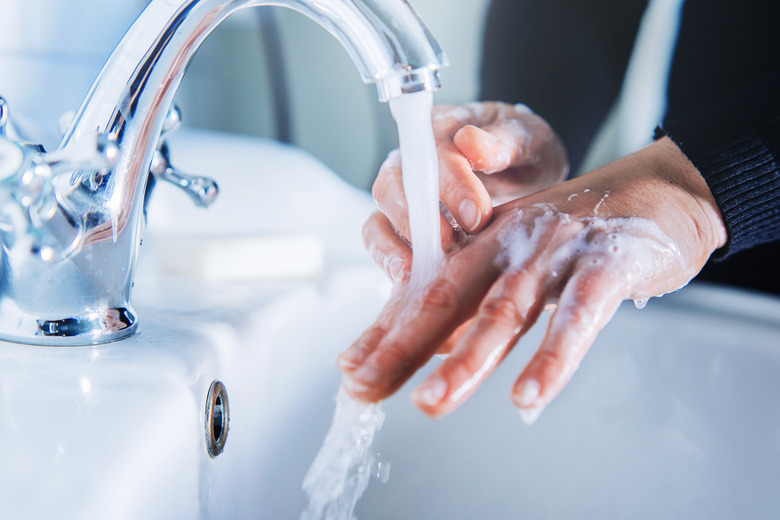 Washing hand at home.