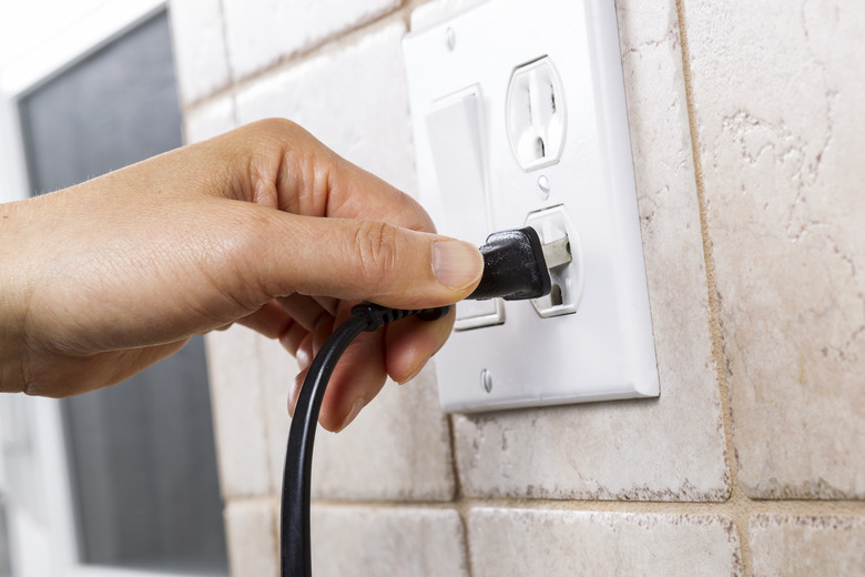 Plugging into Electrical Outlet