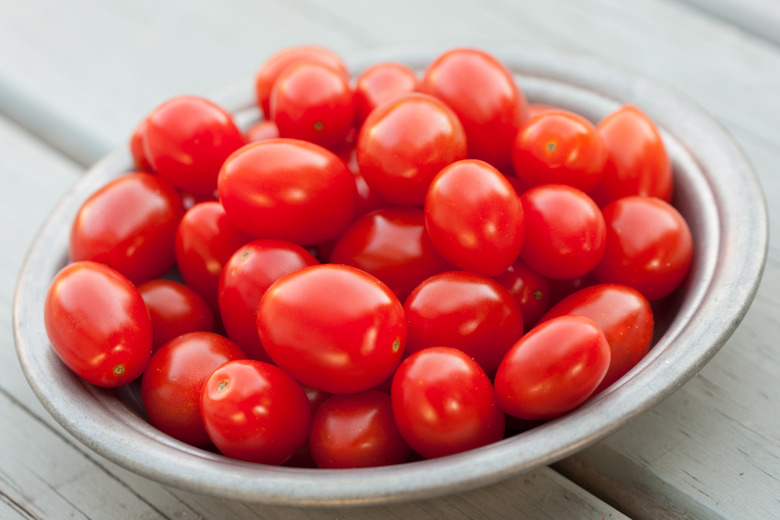 Small heirloom tomatoes in ceramic bowl