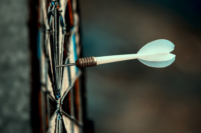 Close-Up Of Dart On Dartboard