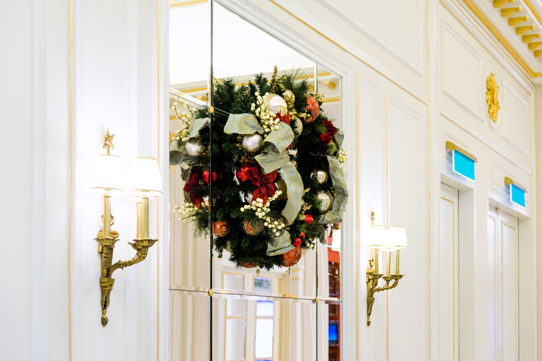 Christmas wreaths on glass window.