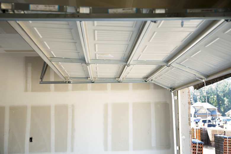 New homes construction site.  Overhead garage door.