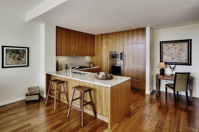 Wood cupboards in modern kitchen