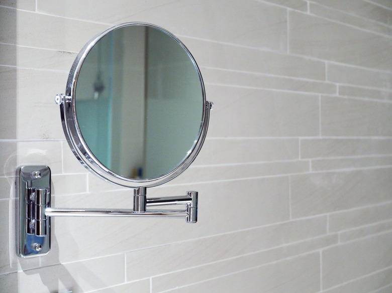 Magnifying glass inside bathroom of modern and convinience hotel.