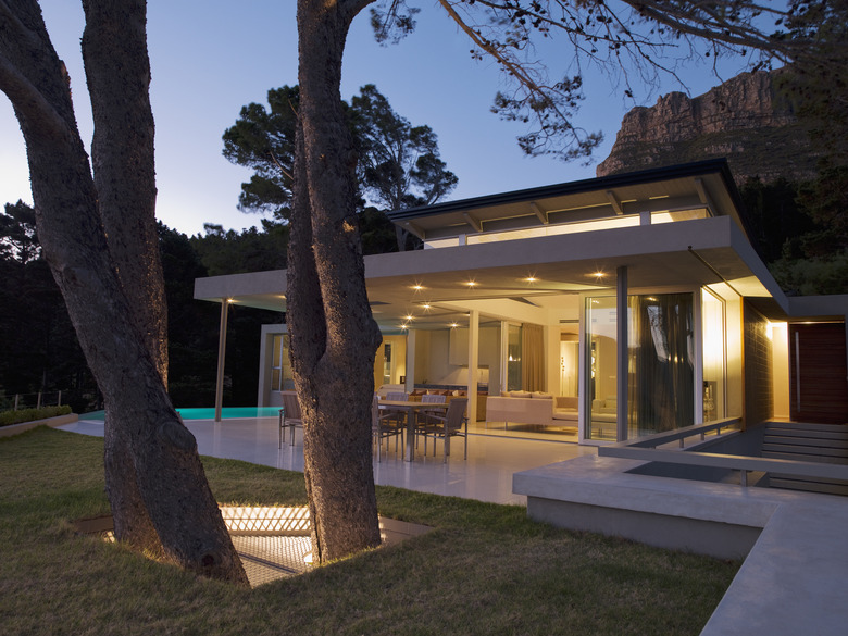 Patio area and glass walls of modern home