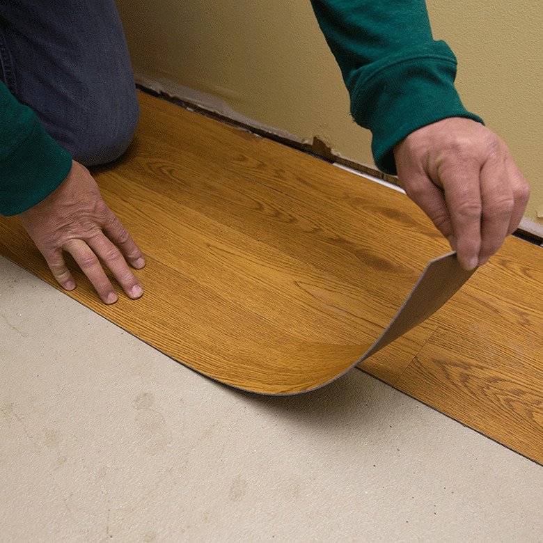 Bending vinyl plank flooring.