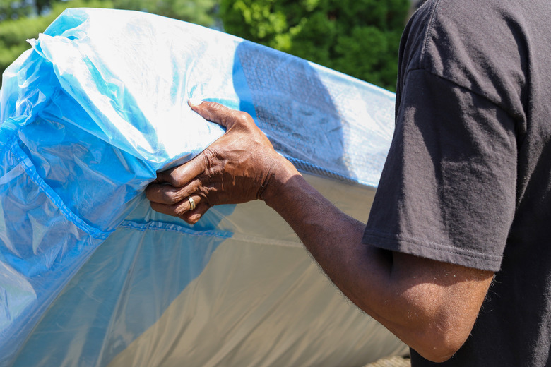 Moving a mattress.