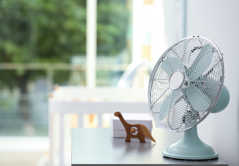 Modern fan in baby's room.