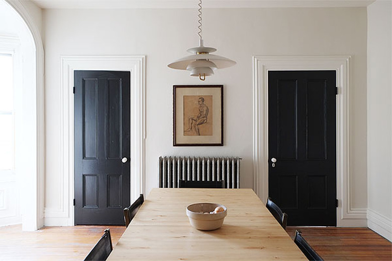 black doors in dining room