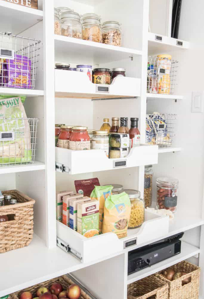 sliding drawers in organized small pantry closet