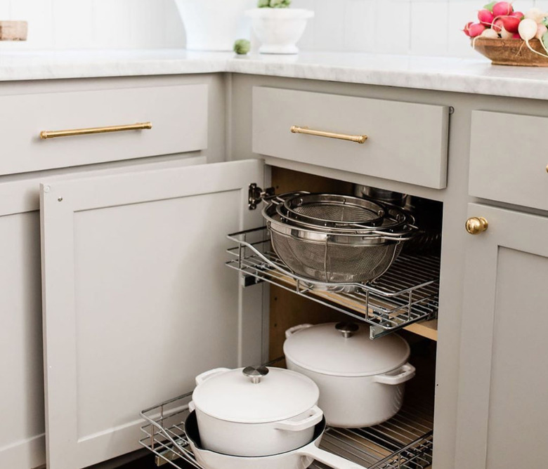 how to organize kitchen cabinets with pull out shelves