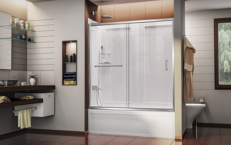 Rectangular tub enclosure in modern bathroom.