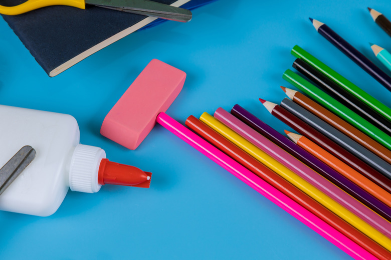 Student material on blue table, back to school